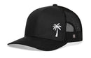 The Haka Hat Palm Tree Trucker Hat | Black Island Snapback by Haka Hat features a white palm tree design on the front left, black mesh sides and back, and an adjustable snapback for comfort.