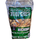 A clear plastic bag of Papa's Brand Hickory Flavor Wood Chips from Papa's Grilling Products, made with natural hardwood for rich BBQ smoke flavor. The bag has cartoon graphics and sits against wood, labeled “Taste the Flavor of Grilling!”.