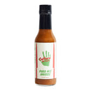 A bottle of Culture Hot Sauce Para Mis Amigos from Culture Hot Sauce, featuring a label with "Para Mis Amigos" and a green handprint. The bottle contains an orange-brown, Mexican-style hot sauce crafted to capture authentic hot sauce flavors.