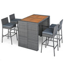 The DirectDeals Patio Acacia Wood Dining Set for Home features a rectangular rattan table with an acacia wood top and four high-back bar stools—ideal for outdoor entertaining and saving space.
