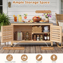 The DirectDeals Outdoor Storage Cabinet with Stainless Steel Countertop sits on a porch with open doors displaying kitchenware and baskets—ideal patio storage for fruit, drinks, and plants with ample space.