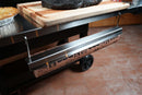 Metal Towel Bar for 18″ Rolls or Smaller hanging from a grill cart as a space-saving way to hold a roll of butcher paper.