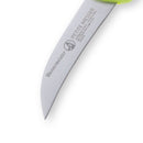A close-up of the pointed tip of a curved Messermeister Petite Messer Parer, part of the Parer Trio Set with Matching Sheaths. The silver blade is engraved with the brand name; the handle is green and partially shown.