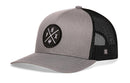 The Haka Hat Phoenix Trucker Hat | Gray-Black PHX X Snapback features a mesh back, round front patch with P, H, X letters and Psi symbol around crossed lines. Part of the HAKA signature 5.0 collection.