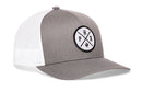 Show your Phoenix pride with the Haka Hat Phoenix Trucker Hat—a gray and white snapback featuring a mesh back and round PHX patch with cactus design, perfect for fans of Arizona.