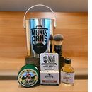 DDR BBQ Supply Manly Cans Dapper Man shave gift set featuring a metal bucket, shaving brush, and Stirling grooming items.
