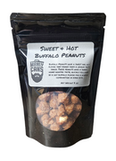 A black resealable bag labeled Manly Cans 3.5 Gallon WeekCAN Warrior Gift Can with a clear window showing peanuts inside. A sweet, hot, and uniquely flavored snack perfect for savory snack lovers from Manly Cans.