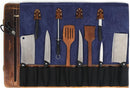 The Aaron Leather Goods Leather Knife Roll offers secure storage for scissors, a sharpening rod, two cleavers, two chef’s knives, spatulas, a serrated knife, and a paring knife—each neatly organized in dedicated slots.