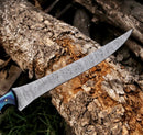 A close-up shows a Damascus steel sword with intricate patterns, beside the Texan Knives 8" Handmade Rasp Steel Sheep Horn Hunting Knife, complete with a leather belt sheath shown resting on a rough tree trunk.