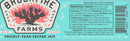 A jam label featuring a cactus illustration displays the name Brushfire Farms Prickly Pear Pepper Jam. Highlighting a distinctive combination of sweet and spicy flavors made with prickly pear and fiery Chile Pequin peppers, the nutrition facts and ingredients—including sugar, apple cider vinegar, and peppers—are printed on a turquoise background.