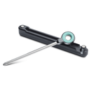 A metallic stick with a circular teal and silver handle rests on a sleek, grooved black case designed to securely hold the FireBoard Pulse precision BBQ thermometer by FireBoard.