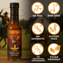 A bottle of Elijah's Xtreme Ranchers Revenge (Ghost Pepper) hot sauce from Elijah's Xtreme is displayed, with icons showing it contains no MSG, is non-GMO, has no extracts, is gluten-free, vegan-friendly, and free from artificial ingredients. In the background, a cowboy lassos.