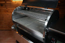 Recteq Backyard Beast 1200 with an open lid, showing a lower main grate and a Pimp My Grill® Gen2 Slide-Out Rack System - 1 Rack.