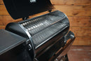 A Recteq Patio Legend 410 pellet grill with a Pimp My Grill® Gen2 Slide-Out Rack System installed, featuring two levels of metal slide-out grill grates with the lid open.