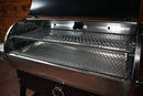 Two stacked stainless steel Pimp My Grill® Gen2 Slide-Out Rack System racks for a Recteq RT-700 / RT-680 inside an open pellet grill.