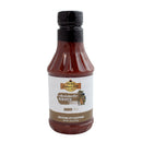 A pack of two 18 oz bottles of Hickman's BBQ Appalachian Red Gluten Free Vinegar-Based BBQ Sauce, featuring a brown and white label with a cartoon chef and the slogan “Because Pit Happens.” This classic sauce, from Hickman's BBQ, celebrates the traditional vinegar-based barbecue flavors cherished in Appalachian cooking.