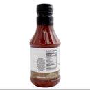 A plastic bottle of Hickman's BBQ Appalachian Red Gluten Free Vinegar-Based BBQ Sauce (18 oz) with a black cap, displaying the nutrition facts and ingredients label on the back. The sauce inside is a dark reddish-brown, emphasizing its classic vinegar-based BBQ style from Hickman's BBQ.