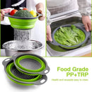 Collapsible green and gray Silicone vegetable and fruit cleaning and drainage baskets from Lovely Home Icon are shown draining vegetables over a sink. One image shows water rinsing vegetables, another displays lettuce inside the basket, and a third features two baskets stacked together. Crafted from food-grade PP+TRP material for safety and durability, this foldable kitchen water filter net is an essential gadget for any modern home.