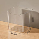 The Lovely Home Icon 1PCS Refrigerator Side Door Storage Box is a clear plastic organizer with a convenient notch on one side, shown here on a wooden surface. Measuring 12 cm tall, 11.7 cm wide, and 9 cm deep, this household kitchen container is perfect for storing food, vegetables, fruit, or eggs—keeping your fridge neat and organized.