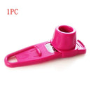 A pink 1PCS Garlic Crusher Press by Lovely Home Icon features a compact, handheld design with a circular opening and blade, similar in appearance to a pencil sharpener, making it easy to use for grating and pressing garlic or ginger.