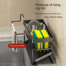 The Lovely Home Icon Sponge Draining Rack – Dishcloth & Dishwashing Liquid Storage, Kitchen Organizer is a black plastic rack with hooks that holds sponges, scrubbers, and brushes. It features a waterproof design and includes a removable rod for hanging rags above your kitchen sink, making it a versatile organizer. The included text highlights the practical removable hanging rod and its multiple uses.