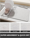 A Lovely Home Icon Coffee Machine Mat with rubber backing and water-absorbent design sits on the kitchen worktop, holding clean dishes. Three small images below display a water drop on the mat: as initially dropped, after 5 seconds, and after 10 seconds. This highly absorbent and quick-drying dish drying pad functions much like innovative diatom mud mats, ensuring excellent moisture control while adding a modern touch to your home decor.