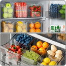 A Lovely Home Icon 1PCS Refrigerator Side Door Storage Box keeps apples, strawberries, blueberries, grapes, pears, oranges, eggs, and snack sticks neatly organized on two refrigerator shelves.