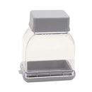 A practical and eco-friendly kitchen gadget, the Manual Pressing Garlic Grinding Grater Cutter from Lovely Home Icon features a clear plastic body with a gray lid and base. Although designed for efficient garlic grinding and peeling, its rectangular shape makes it a versatile accessory—ideal not only for preparing garlic but also as an innovative way to store or serve small seeds or snacks in your kitchen.