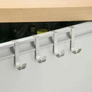 The Lovely Home Icon Multi-Purpose Hooks Kitchen Cabinet Door Back Hook Hanging Rack includes four durable stainless steel hooks that hang over the edge of your cabinet door beneath a wooden countertop. Designed for organizing or hanging kitchen essentials like towels and utensils, this space-saving hanger keeps your items within easy reach while helping you maintain a tidy kitchen.