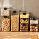 Here’s a rewritten version of your sentence using the provided product data: Lovely Home Icon 1-4PCS Sealed Jars Kitchen Organizer Grain Storage Boxes, large capacity fresh-keeping tanks, are filled with assorted dry foods such as pasta, grains, cornmeal, beans, and nuts and are neatly arranged on a kitchen countertop against a tiled wall.