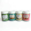 Four jars of SALTOPIA Infused Sea Salts’ Low Sodium Salad Seasonings—Garlic Chive, Chili Lemon, Ranch, and Maple Mustard—make a flavorful, low sodium gift set for salad lovers.