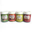 Four jars of Saltopia Low Sodium Seasonings by SALTOPIA Infused Sea Salts are lined up, each with vibrant labels and flavors like Italian Herbs, Butter & Onion, Lemon & Herbs, and Southwestern—for bold taste in low sodium cooking.