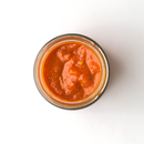 A glass jar of Taycte Famiglia Crispino Calabrese Eggplant Pasta Sauce — Melanzane Sugo, made by Taycte from Italian tomatoes and visible from above on a white background.