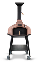 The WPPO LLC Direct Wood Fired Stone Oven for Bread not Pizza!, Red Rock 100, is a freestanding outdoor oven equipped with a chimney, thermometer, black legs, wooden handles, and four caster wheels—ideal as a versatile bread oven. This stone oven by WPPO LLC Direct is shown against a white background.