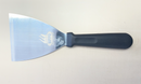 A WPPO Utility knife for dough, from WPPO LLC Direct, featuring a black handle and a blade with a flame logo and the words "GRIT FIRED UP," lies flat on a light surface.