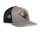The Haka Hat JBR Silver Logo Metallic Leather Snapback by Haka Hat features a gray and black trucker style with a mesh back and an embroidered front panel displaying a stylized cartoon figure wearing a hat.