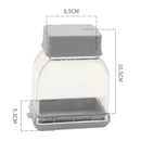Clear plastic and gray Manual Pressing Garlic Grinding Grater Cutter Cooking Tool with a square lid by Lovely Home Icon—an eco-friendly kitchen accessory. Dimensions: 8.5 cm wide, 10.5 cm tall, and 5.3 cm deep, as illustrated with dashed measurement lines.