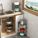A kitchen corner in Mainland China features the Lovely Home Icon Kitchen Sink Storage Rack Multi-Layer Cooker Storage Rack, with adjustable pot racks neatly organizing cookware against white tiled walls. Some racks are installed under the sink and others beside it, showcasing their simple assembly and versatile installation methods, while a window frames a scenic view.
