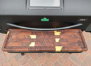 The BBQ Boards® GMG Peak Prime 2.0 Front Cutting Board features a blend of dark, light, and yellowish wood patterns—ideal for prepping next to your Green Mountain Grills or as a stylish pellet grill accessory.