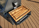 The BBQ Boards® Napoleon Prestige 500 Side Cutting Board adds ideal grill prep space on a wooden deck, fitting perfectly on your Napoleon Prestige 500 side board.