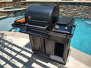 The BBQ Boards® Traeger Timberline Side Cutting Board by BBQ Boards® is the perfect patio BBQ prep station, ideal for modern outdoor grilling and entertaining next to a pool with stylish stone walls and a hot tub.