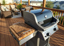 A BBQ Boards® Weber Spirit Old Gen Side Cutting Board by BBQ Boards® is on a spacious deck with wicker chairs, a couch, and outdoor cushions, overlooking a suburban neighborhood.