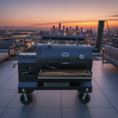BBQ Boards® Yoder YS1500 Front & Pellet Bin Cutting Boards (Pair) by BBQ Boards® are featured on a rooftop patio with city views, paired with modern seating and a grill for effortless outdoor cooking.