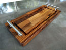 The BBQ Boards® Yoder YS640 Trio Set of 3 cutting boards adds a premium touch to your grill workspace, perfect for upgrading your BBQ area with durable wooden boards, shown on a sleek gray surface.