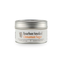 A 4 oz (113 g) silver tin of Bourbon Barrel Foods Bourbon Smoked Cinnamon Sugar, handcrafted bourbon barrel smoked finishing sugar, features orange and black text and is shown on a plain white background.
