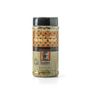 A clear plastic spice jar with a black lid holds Bourbon Barrel Foods Bourbon Smoked Garlic Salt. The label shows orange geometric designs, a barrel, and garlic bulb. Set on a white background—ideal for smoky seasoning enthusiasts.