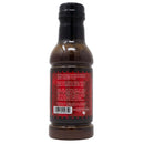 A bottle of Chicken Fried BBQ Brisket Wrap sauce by Chicken Fried BBQ is shown from the back, featuring a red label with instructions. The dark brown sauce in a plastic bottle with a dark cap is perfect for enhancing brisket bark.