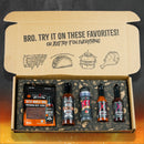 The Elijah’s Xtreme BBQ Bro Box Ultimate Gift Set by Elijah’s Xtreme displays hot sauces, seasoning, and beef jerky. The inside lid says, “Bro. Try it on these favorites! Or just try it on everything,” with food illustrations.