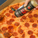 Hot honey is poured onto a pepperoni pizza in a box, giving the slices a glossy finish—an ideal pairing with the Elijah's Xtreme BBQ Bro Box Ultimate Gift Set by Elijah's Xtreme for fans of bold, spicy flavors.