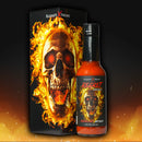 A bottle of Elijah's Xtreme Regret Reserve Hot Sauce by Elijah's Xtreme sits in front of its box, which features a fiery skull graphic and bold label that highlight the intense heat inside.
